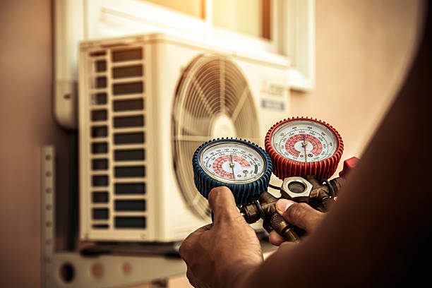 Professional Heat Pump Repair technician working in Rapid City, MI